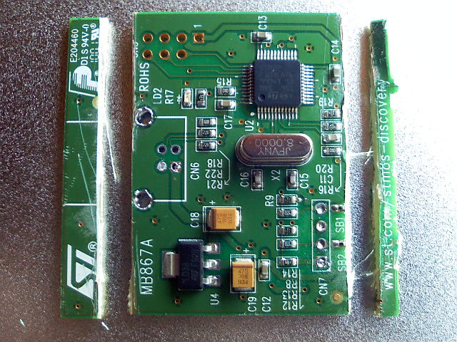 Cut two edges of STM32 part of STM8S Discovery Kit